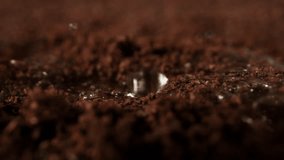 Super Slow Motion Detail Shot of Brewing Ground Coffee with Hot Water at 1000fps. - Powered by Shutterstock - Get 15% off with code: PIKWIZARD15