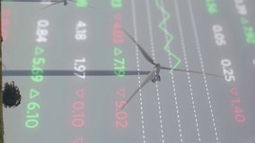 Animation of data processing over wind turbines. global business and digital interface concept digitally generated video. - Powered by Shutterstock - Get 15% off with code: PIKWIZARD15