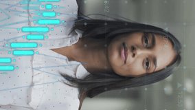 Animation of data processing over businesswoman smiling in office. Global business and digital interface concept digitally generated video. - Powered by Shutterstock - Get 15% off with code: PIKWIZARD15