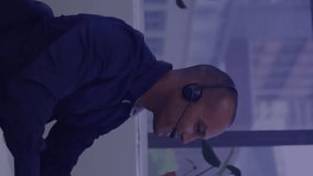 Animation of financial data processing over diverse business people working in office. Global business, finances, computing and data processing concept digitally generated video. - Powered by Shutterstock - Get 15% off with code: PIKWIZARD15