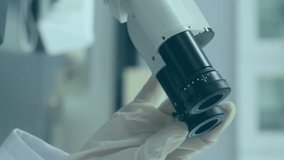 Animation of Covid 19 coronavirus cases growing over female scientist wearing lab coat using microscope. Global Covid 19 pandemic concept digitally generated image. - Powered by Shutterstock - Get 15% off with code: PIKWIZARD15