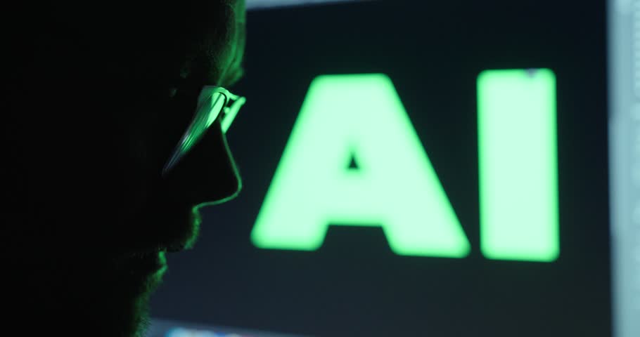 A man in the dark using AI for criminal activities