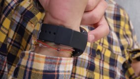 Animation of social media icons and numbers on white banners over man checking smartwatch. global networking, social media, technology and digital interface concept digitally generated vide - Powered by Shutterstock - Get 15% off with code: PIKWIZARD15