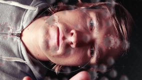 Digital illustration of macro Covid-19 cells floating over Caucasian man using 3D interactive screen. Coronavirus Covid-19 pandemic concept digital composite - Powered by Shutterstock - Get 15% off with code: PIKWIZARD15