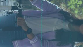 Animation of data processing and globe over woman with bicycle. Global business, finances and digital interface concept digitally generated video. - Powered by Shutterstock - Get 15% off with code: PIKWIZARD15