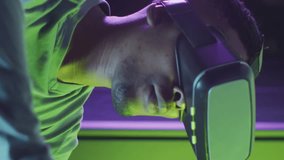 Animation of data processing, african american male it engineer in vr goggles and computer servers. Global computing and data processing concept digitally generated video - Powered by Shutterstock - Get 15% off with code: PIKWIZARD15