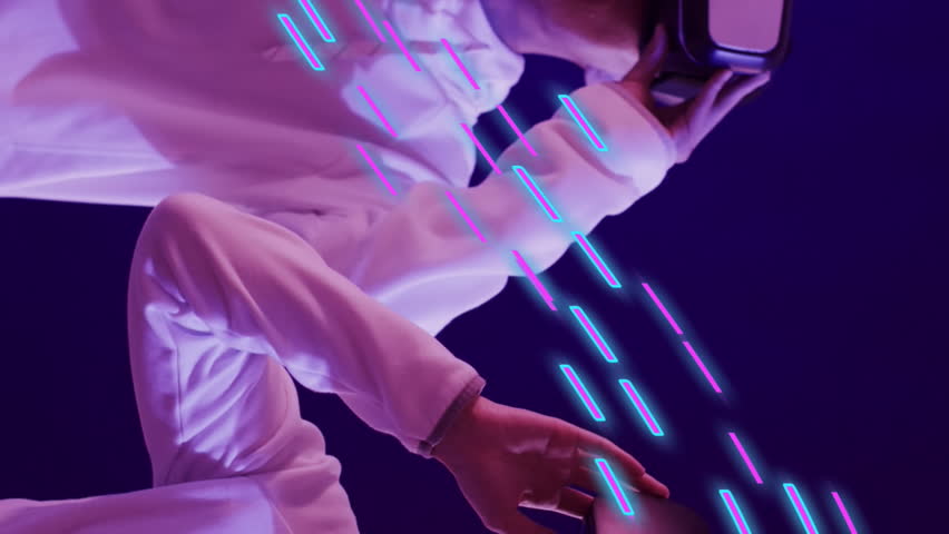 Animation of glowing light trails of data transfer and asian people in vr headset. Global virtual reality, data processing, computing and digital interface concept digitally generated video. - Powered by Shutterstock - Get 15% off with code: PIKWIZARD15