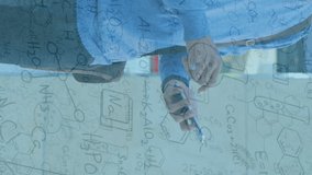 Animation of scientific formulae over man using smartphone. digital interface global connection and science concept digitally generated video. - Powered by Shutterstock - Get 15% off with code: PIKWIZARD15