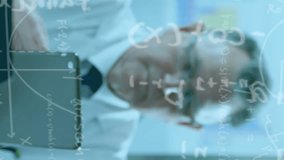 Animation of mathematical and scientific formulae over male scientist using tablet. science research and medicine concept digitally generated image. - Powered by Shutterstock - Get 15% off with code: PIKWIZARD15