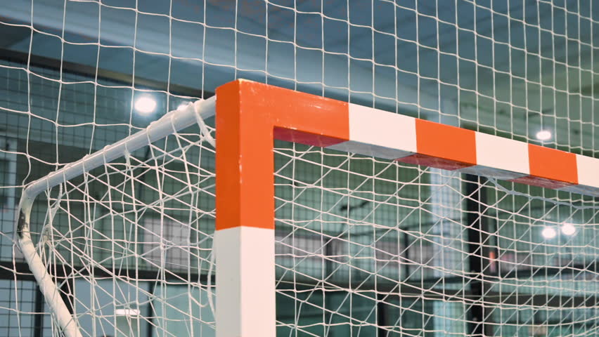 Futsal Soccer Ball Hits the Bar and Bounces in Slow Motion. High quality FullHD footage