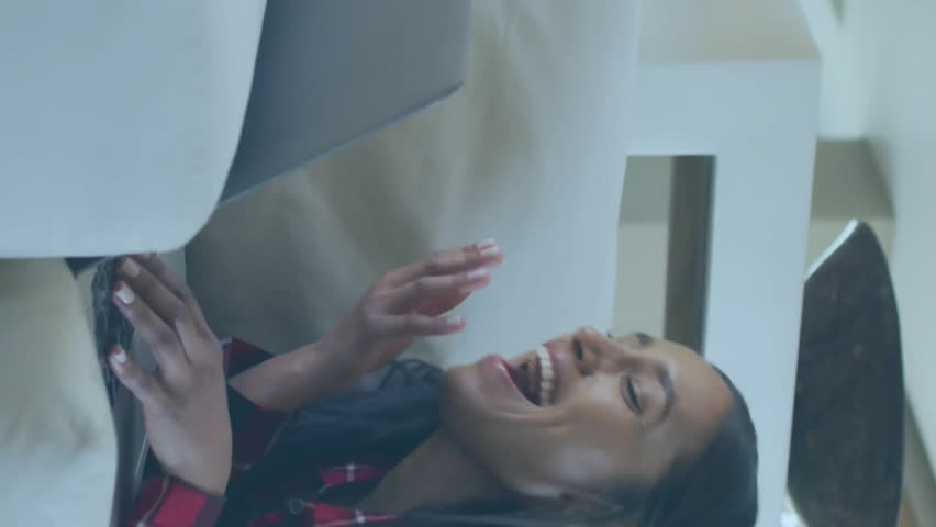 Animation of icons and data processing over woman using laptop. Global social media, connections, computing and data processing concept digitally generated video. - Powered by Shutterstock - Get 15% off with code: PIKWIZARD15