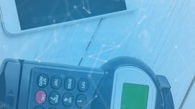 Animation of bitcoins over smartphone and payment terminal. global data security, finance and contactless payments safety concept digitally generated video. - Powered by Shutterstock - Get 15% off with code: PIKWIZARD15