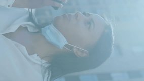 A black woman is talking on her smartphone and wearing a face mask while walking in a city street. Global digital interface technology and connections concept digitally generated video. - Powered by Shutterstock - Get 15% off with code: PIKWIZARD15