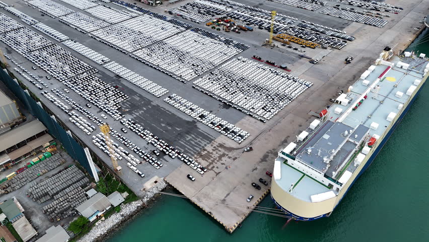Many new cars running cargo ship, Ro-Ro Ship for import export shipping cars by Vessel Freight forwarding service ship, Logistics transportation dealer shipping Cars Cars Export Terminal at Yokohama