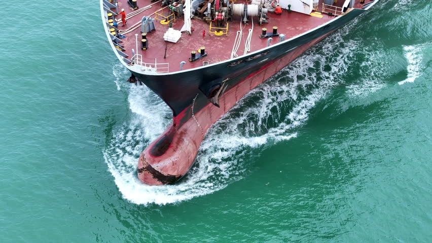 Nose Cargo container Ship, cargo vessel ship carrying container and running for import export concept technology freight shipping sea freight by Express Ship. front view