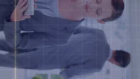 Animation of diagram and shapes over diverse business people working in office. Global business and digital interface concept digitally generated video. - Powered by Shutterstock - Get 15% off with code: PIKWIZARD15