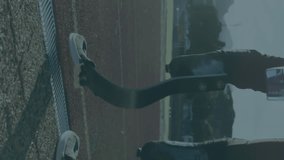 Animation of digital data processing over disabled male athlete with running blades on racing track. global sports, competition, disability and digital interface concept digitally generated video. - Powered by Shutterstock - Get 15% off with code: PIKWIZARD15