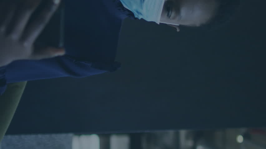 Animation of financial data processing over businesswoman with face mask using smartphone in office. global business and digital interface during covid 19 pandemic concept digitally generated video. - Powered by Shutterstock - Get 15% off with code: PIKWIZARD15