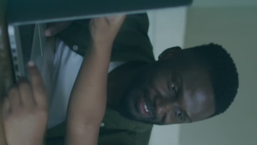 Animation of data processing over happy african american father and son using laptop. Family, spending time together with technology concept digitally generated video. - Powered by Shutterstock - Get 15% off with code: PIKWIZARD15