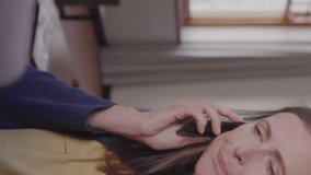 Animation of numbers and data processing over caucasian woman using smartphone. Global data processing and digital interface concept digitally generated video. - Powered by Shutterstock - Get 15% off with code: PIKWIZARD15