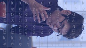 Animation of statistics data processing over asian businessman using laptop in office. Global business, communication, digital interface, finance and data processing concept digitally generated video. - Powered by Shutterstock - Get 15% off with code: PIKWIZARD15