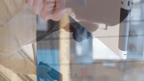 Animation of men using laptop over asian business women using smartphone. global business, success, connections and data processing concept digitally generated video. - Powered by Shutterstock - Get 15% off with code: PIKWIZARD15