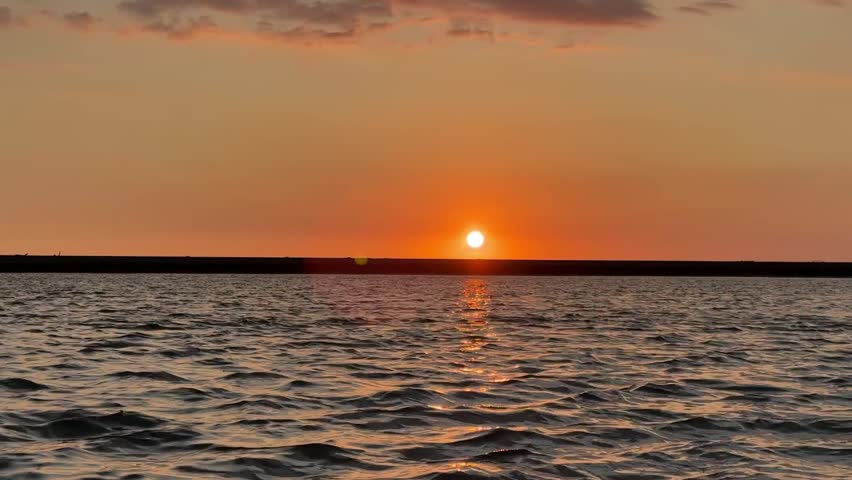 Sunset over the Pacific Ocean in Rio Grande de Tarcoles, Costa Rica