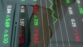 Animation of financial data processing over businessman using smartphone. Global business digital interface technology and networking concept digitally generated video. - Powered by Shutterstock - Get 15% off with code: PIKWIZARD15