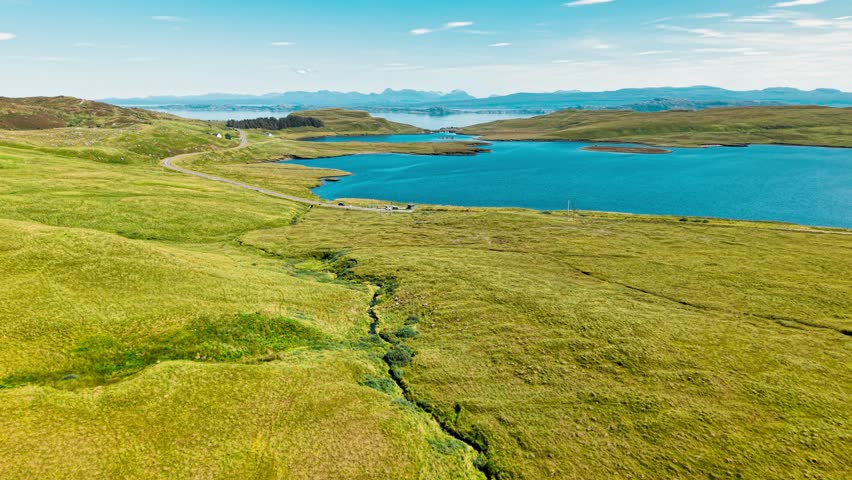 An expansive aerial view reveals Scotland