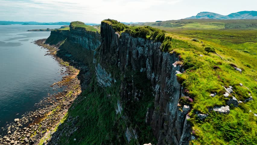 Overlooking the dramatic cliffs and tranquil waters of Scotland