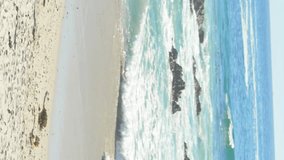 Animation of bulb icons over midsection of woman using smartphone at beach. global connections, social media, technology and digital interface concept digitally generated video. - Powered by Shutterstock - Get 15% off with code: PIKWIZARD15