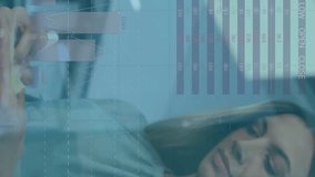 Animation of charts processing data over caucasian casual businesswoman brainstorming at office. Business, connection, digital interface and communication, digitally generated video. - Powered by Shutterstock - Get 15% off with code: PIKWIZARD15