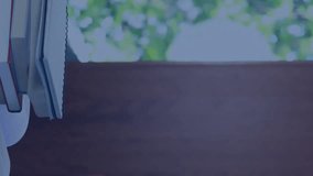 Animation of charts processing over happy caucasian female student at desk with books. Learning, education, data, digital interface and communication, digitally generated video. - Powered by Shutterstock - Get 15% off with code: PIKWIZARD15