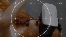 Scope scanning over grid network against caucasian woman wearing vr headset at home. computer interface and technology concept - Powered by Shutterstock - Get 15% off with code: PIKWIZARD15