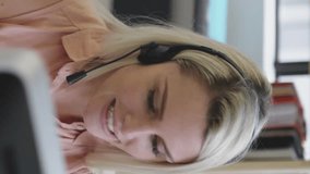 Animation of media icons over caucasian businesswoman using phone headset. global networks, business, data processing and digital interface concept digitally generated video. - Powered by Shutterstock - Get 15% off with code: PIKWIZARD15