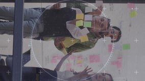 Animation of data processing over diverse business people in office. Global business, digital interface, computing and data processing concept digitally generated video. - Powered by Shutterstock - Get 15% off with code: PIKWIZARD15