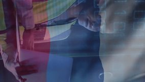 Binary code and flag animation over worker using laptop in industrial setting. Technology, industry, cybersecurity, coding, manufacturing, digital - Powered by Shutterstock - Get 15% off with code: PIKWIZARD15