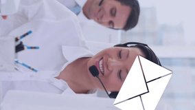 Digital composite of an Asian female call centre agent typing while talking on a headset with message icons flying in the foreground. Behind her are her fellow call centre agents 4k - Powered by Shutterstock - Get 15% off with code: PIKWIZARD15