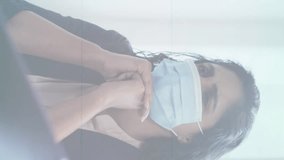 Stop sign over covid-19 cells moving against thoughtful woman wearing face mask at office. coronavirus covid-19 pandemic concept - Powered by Shutterstock - Get 15% off with code: PIKWIZARD15