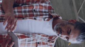 Animation of data processing over caucasian businessman using tablet. Global business and digital interface concept digitally generated video. - Powered by Shutterstock - Get 15% off with code: PIKWIZARD15