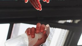 Animation of light spots over diverse people disinfecting hands. Protection, virus, healthcare and lifestyle concept digitally generated video. - Powered by Shutterstock - Get 15% off with code: PIKWIZARD15