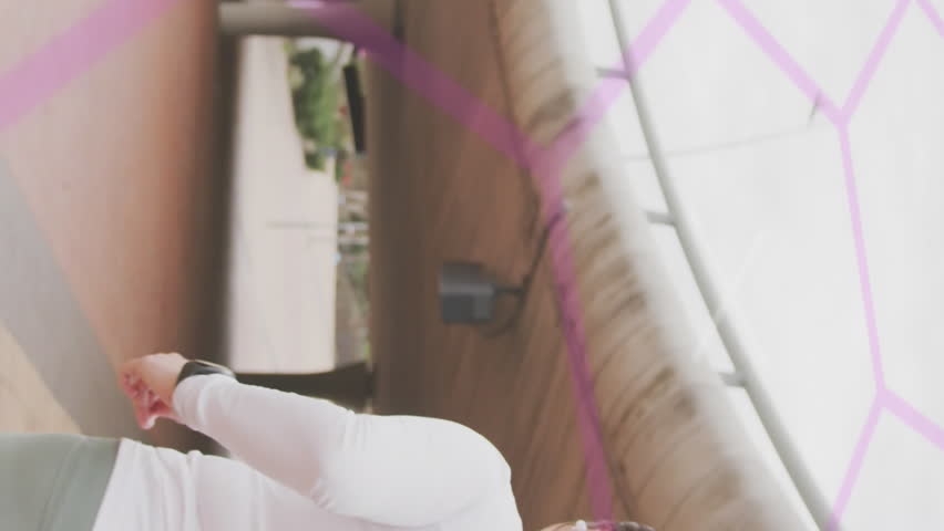 Animation of data processing over plus size caucasian woman exercising in city. Sports, active lifestyle, urban living and happiness concept digitally generated video.
