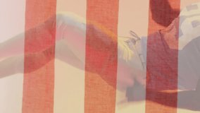 Animation of african american football player and flag of usa. American patriotism, sports and competition concept digitally generated video. - Powered by Shutterstock - Get 15% off with code: PIKWIZARD15