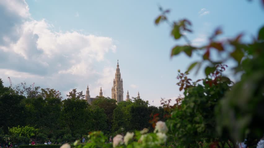 The Rathaus municipality in Vienna over the trees in summer in Europe