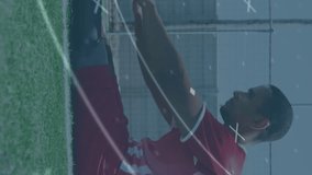 Animation of scope scanning over male football player stretching legs on pitch. fitness, sport and competition concept digitally generated video. - Powered by Shutterstock - Get 15% off with code: PIKWIZARD15