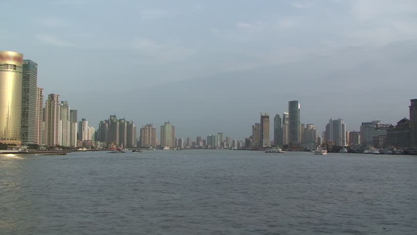 Timelapse river scene with many ships.