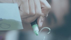 Animation of data processing over businessman taking notes on glass wall. Global business and digital interface concept digitally generated video. - Powered by Shutterstock - Get 15% off with code: PIKWIZARD15