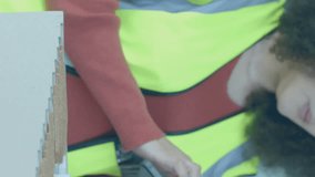 Animation of financial data processing over woman checking 3d model in office. Global business, finance, computing and data processing concept digitally generated video. - Powered by Shutterstock - Get 15% off with code: PIKWIZARD15