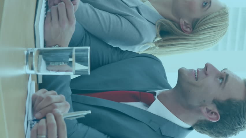 Animation of 5G digital interface with network of connections and icons over business people greeting shaking hands at meeting. Global connection network technology concept digitally generated image. - Powered by Shutterstock - Get 15% off with code: PIKWIZARD15