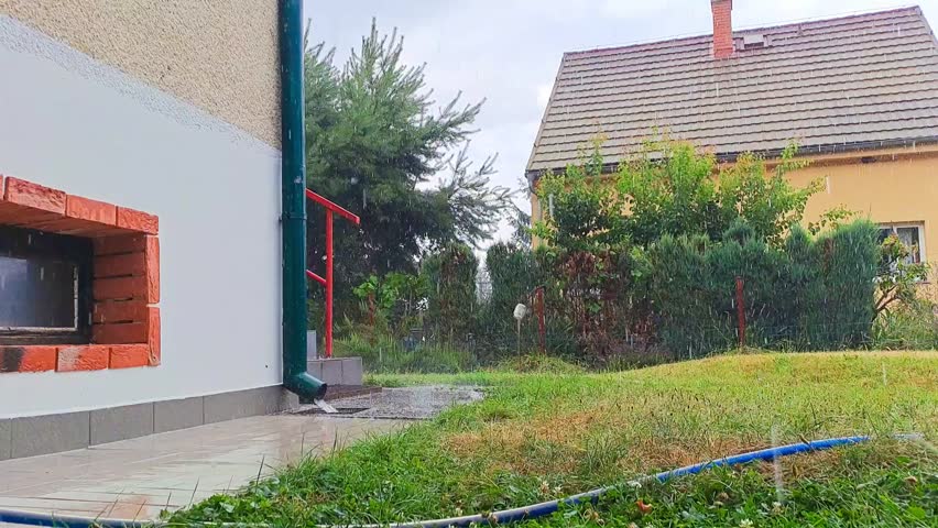 part of the house and beautiful view during summer rain in the Czech Republic